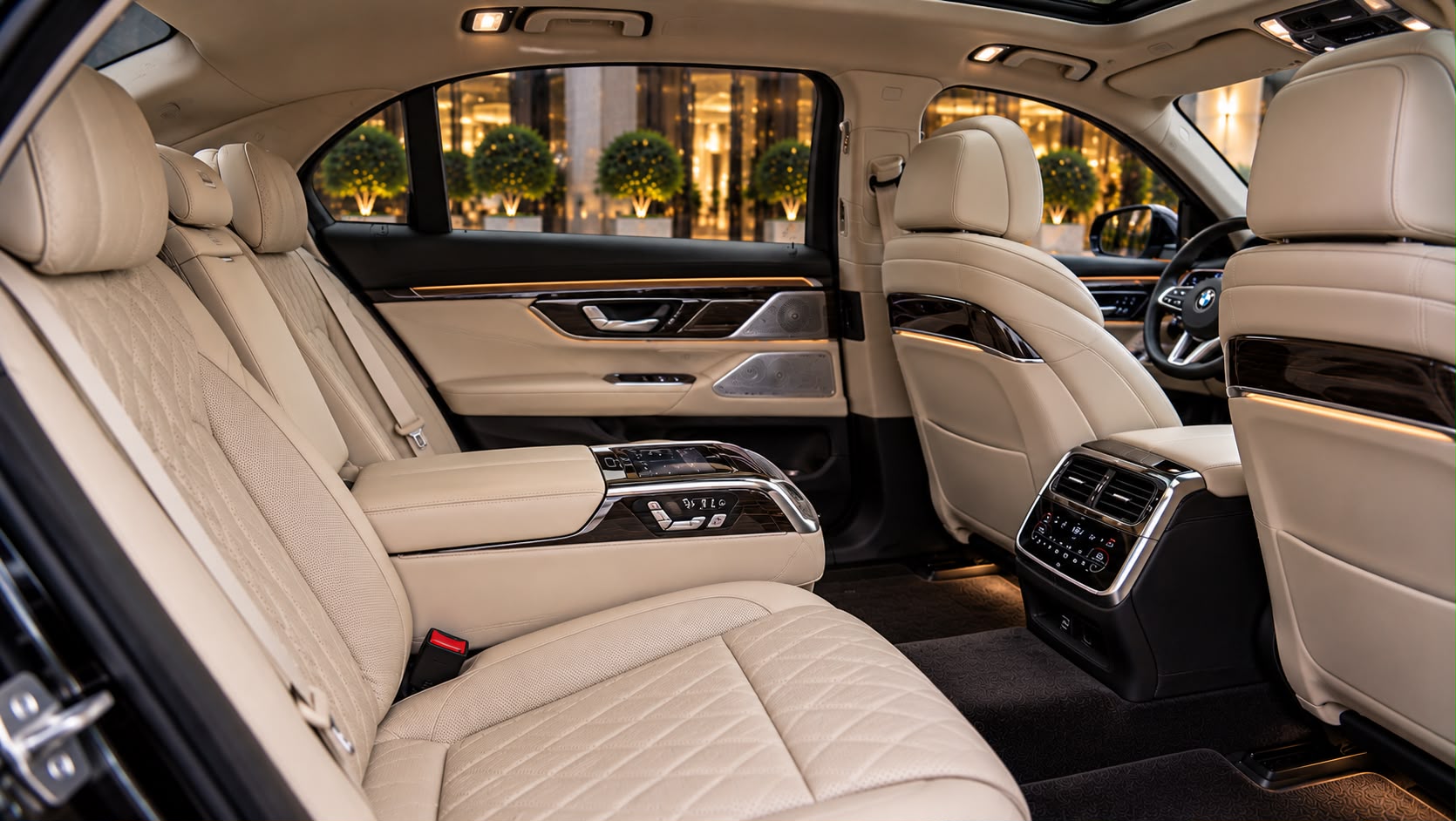 BMW 7 Series beige rear passenger interior